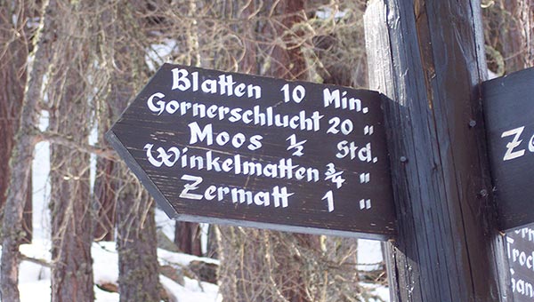 Sign with place names like, "Blatten, Gornerschlucht, Moos, Winkelmatten, and Zermatt"