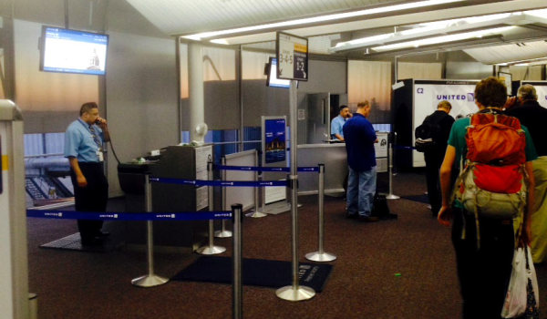 United worker speaks over the PA system at O'Hare airport